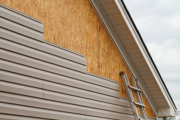Professional Emergency Siding Repair technician working in Tilghman, MD